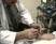Dr Dutkowsky showing how he conducts a carpal tunnel test.